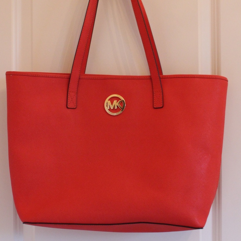 Michael Kors red tote bag